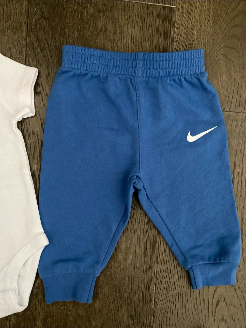 Nike White Bodysuit with Blue Joggers Baby Set